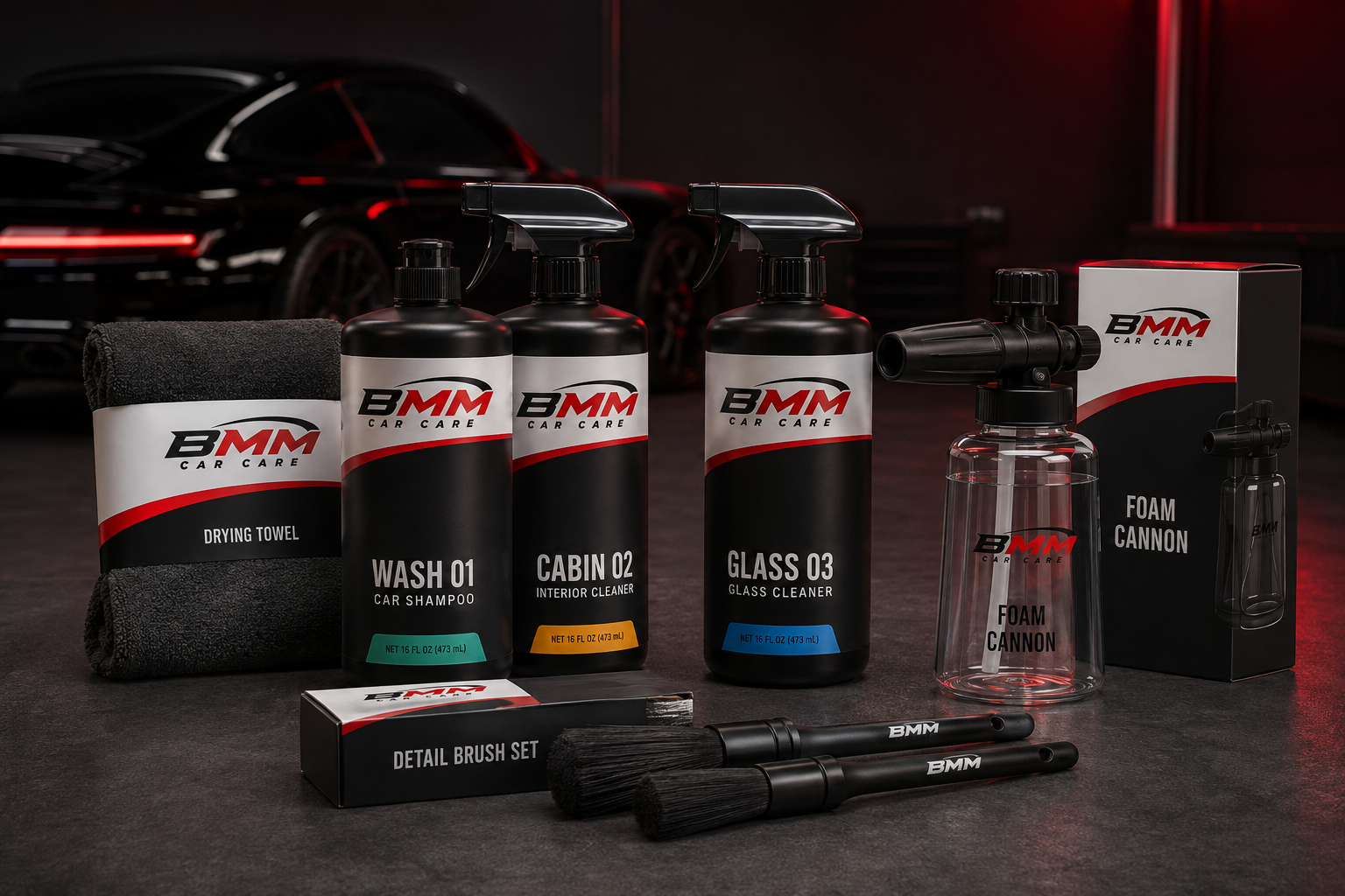 BMM Label A Wash, Cabin and Glass bottles with a drying towel, brushes and foam cannon in a detailing garage